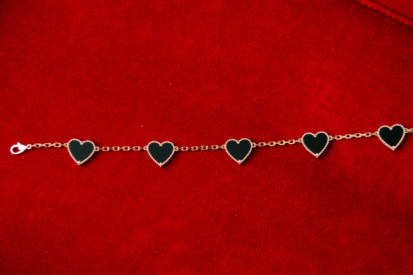 18k LUV Bracelett mit schwarzen Onyx-Herzen – ca. 10 g