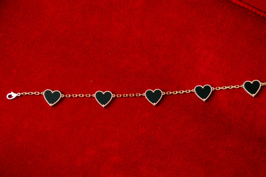 18k LUV Bracelett mit schwarzen Onyx-Herzen – ca. 10 g